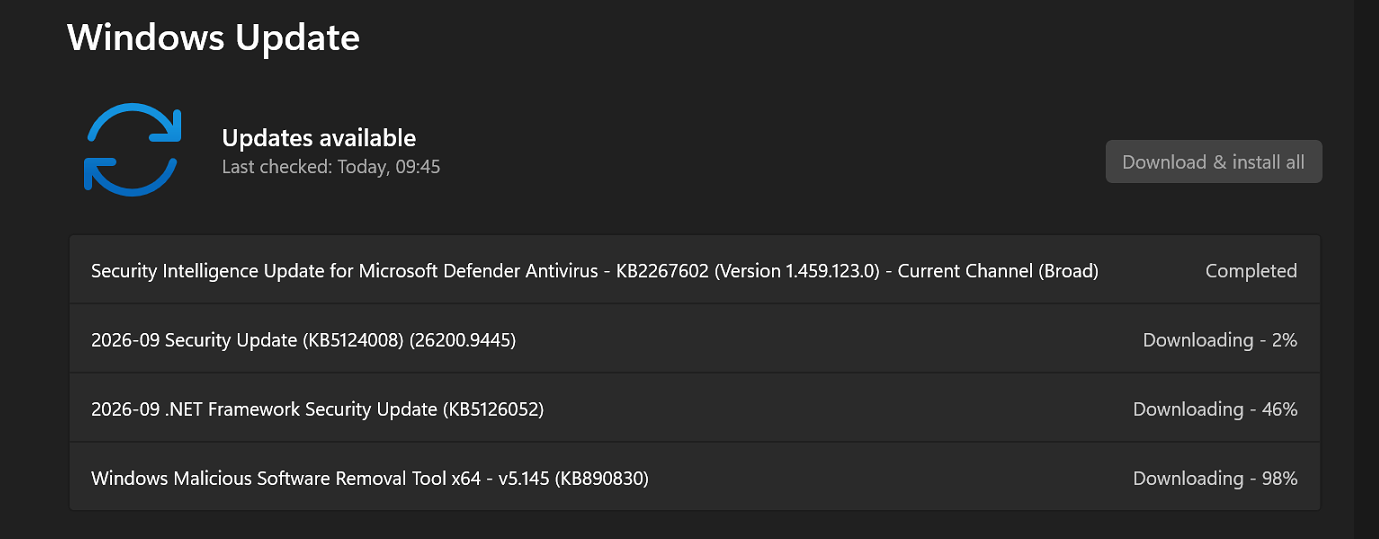 Windows Update page showing KB5124008 (26200.9445) downloading alongside KB5126052 and MSRT